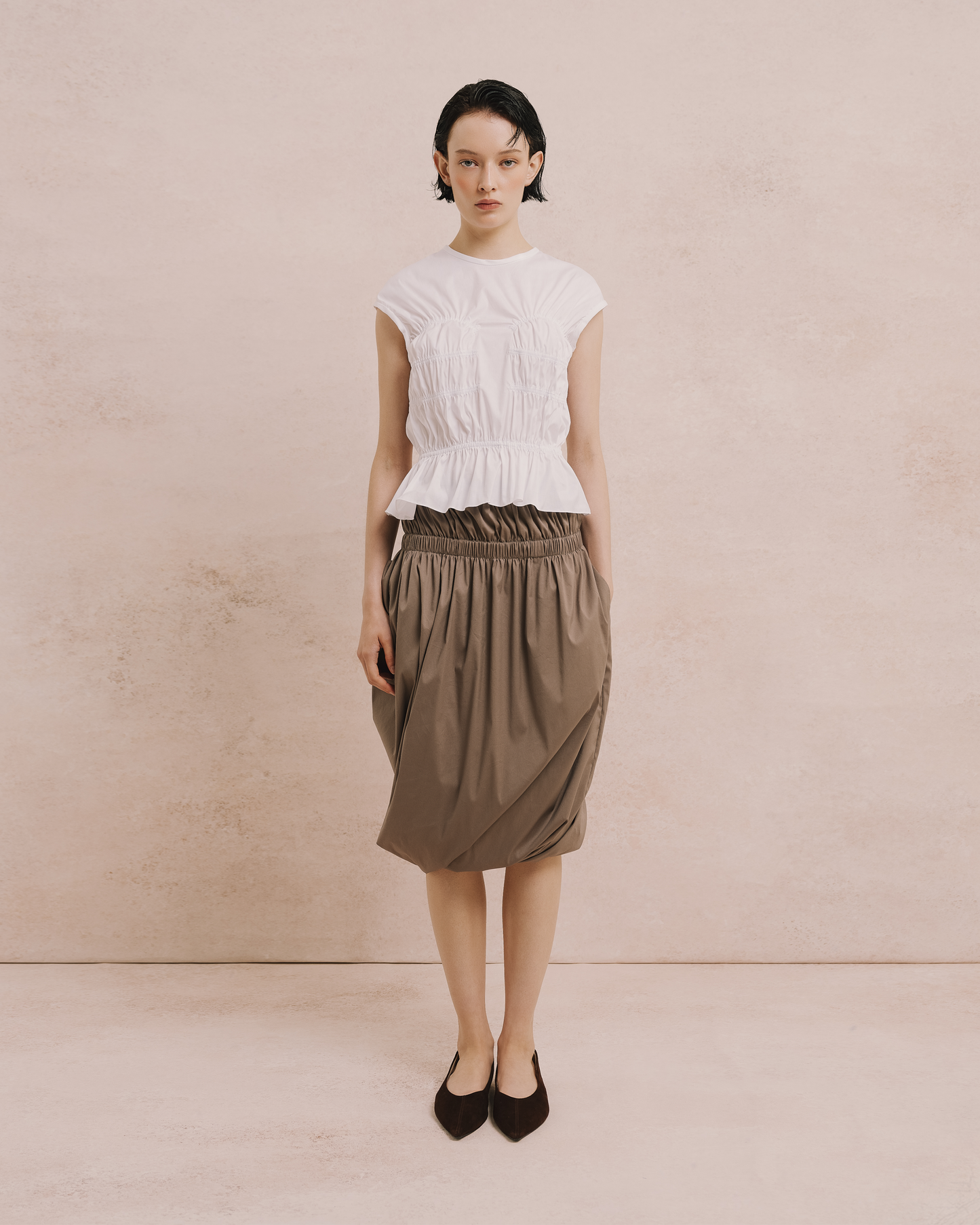Model wears the Amelia Toro Cotton Gathered Top in white, front view