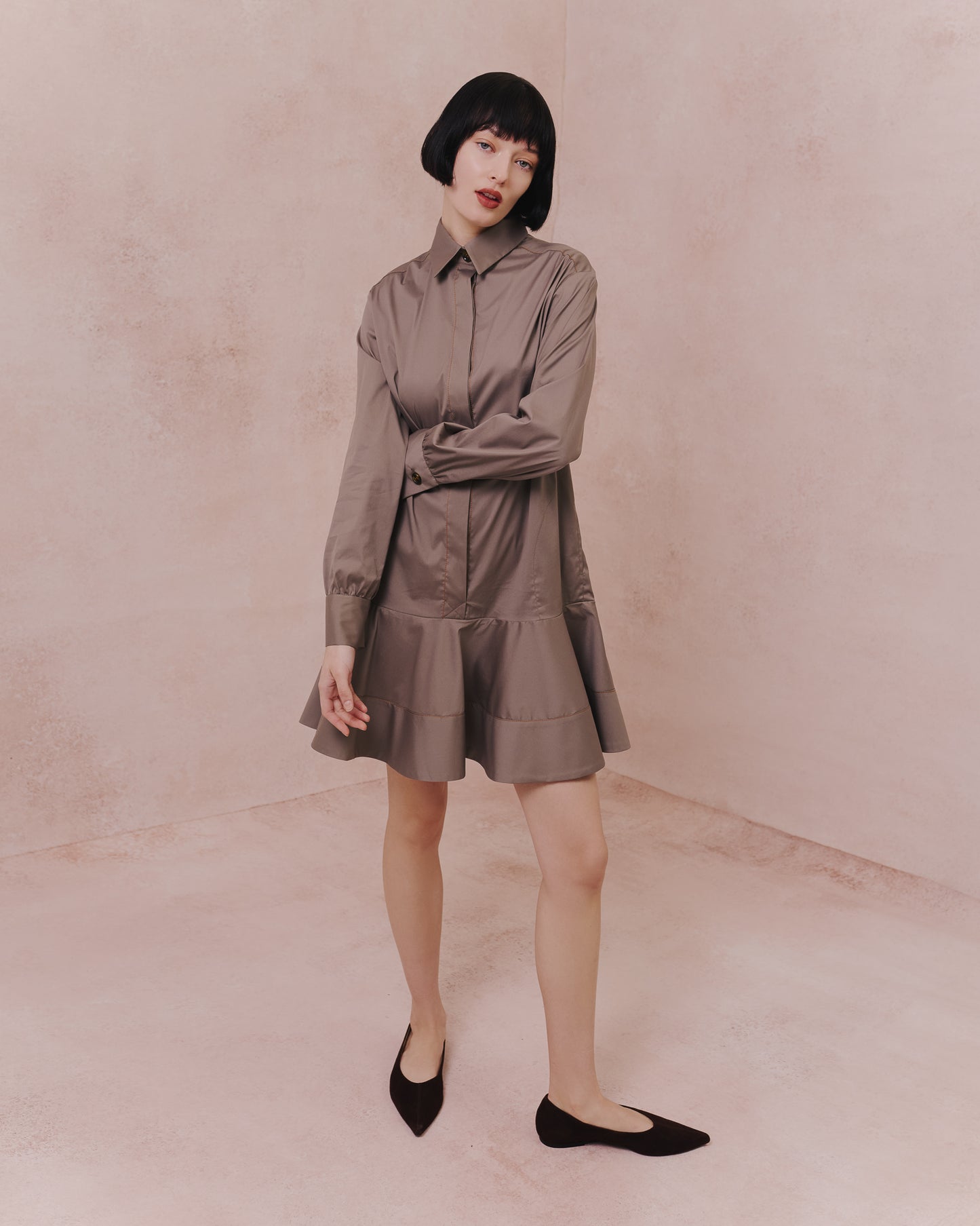 Model wears the Amelia Toro Cotton Shirt Dress in tabaco, front view