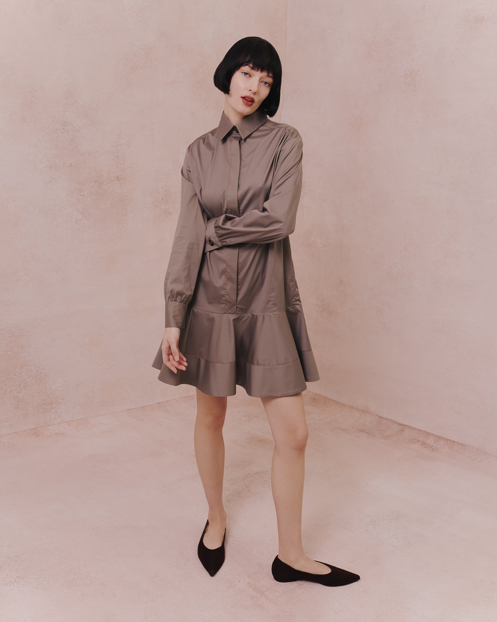 Model wears the Amelia Toro Cotton Shirt Dress in tabaco, front view