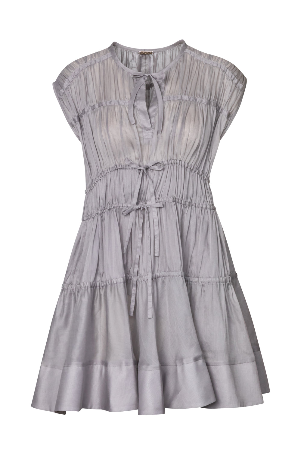 Product still of the Amelia Toro Cotton Voile Tiered Mini Dress in grey on a white background