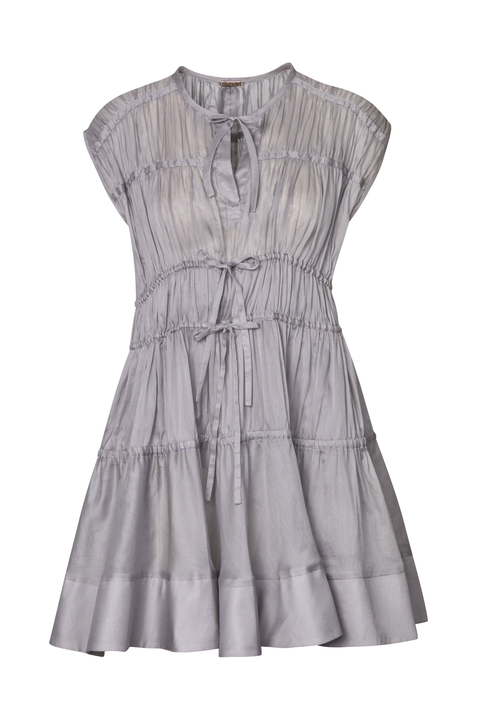 Product still of the Amelia Toro Cotton Voile Tiered Mini Dress in grey on a white background