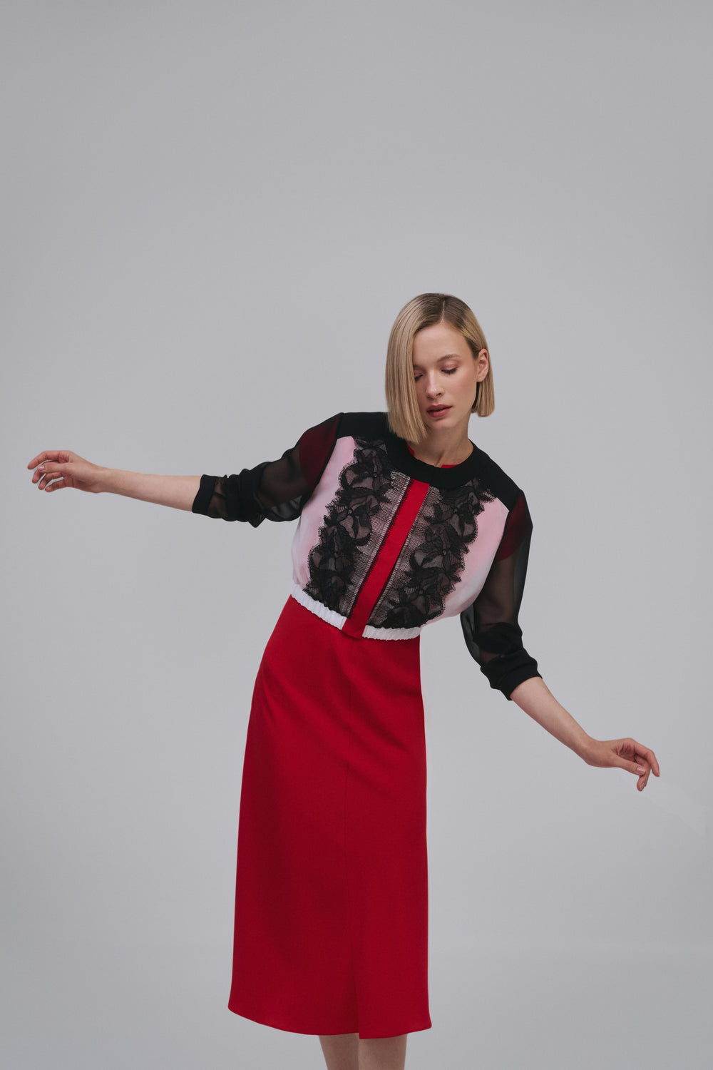 Model wears the Amelia Toro Embroidered Silk Chiffon Bolero Jacket in Black & White, front view