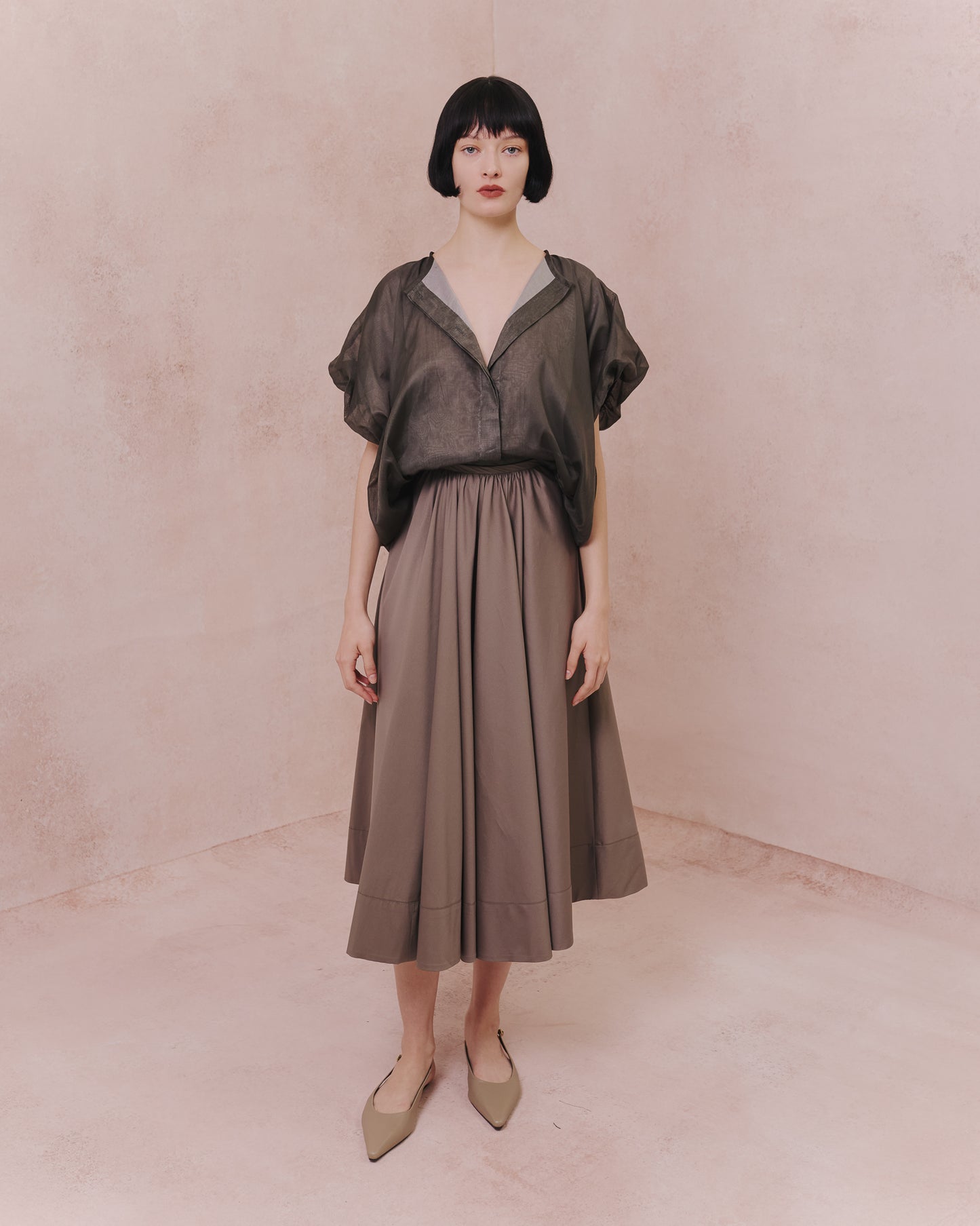 Model wears the Amelia Toro Full Circle Cotton Skirt in blue, front view