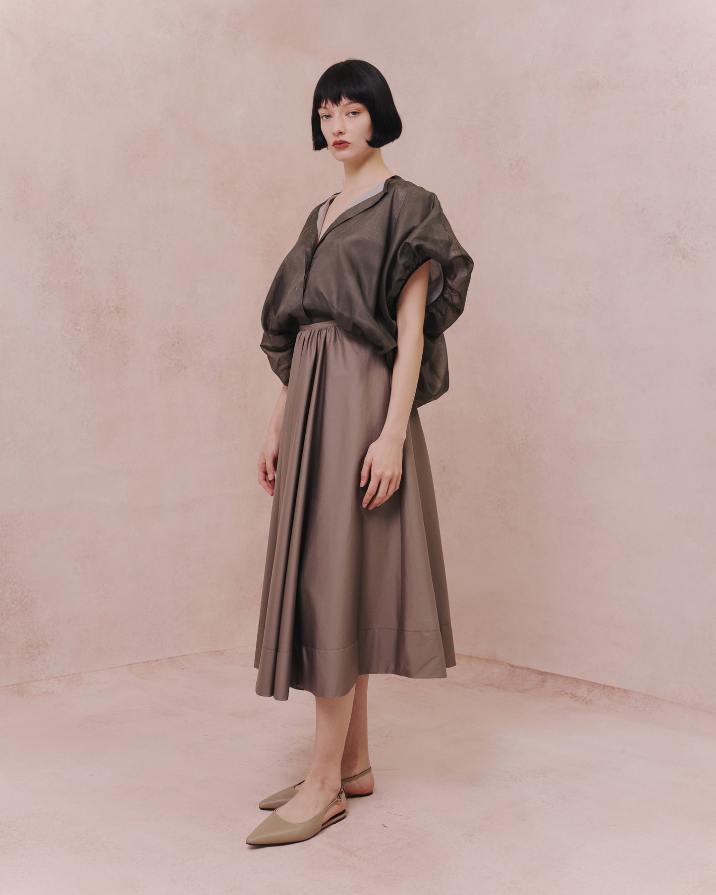 Model wears the Amelia Toro Full Circle Cotton Skirt in blue, front view