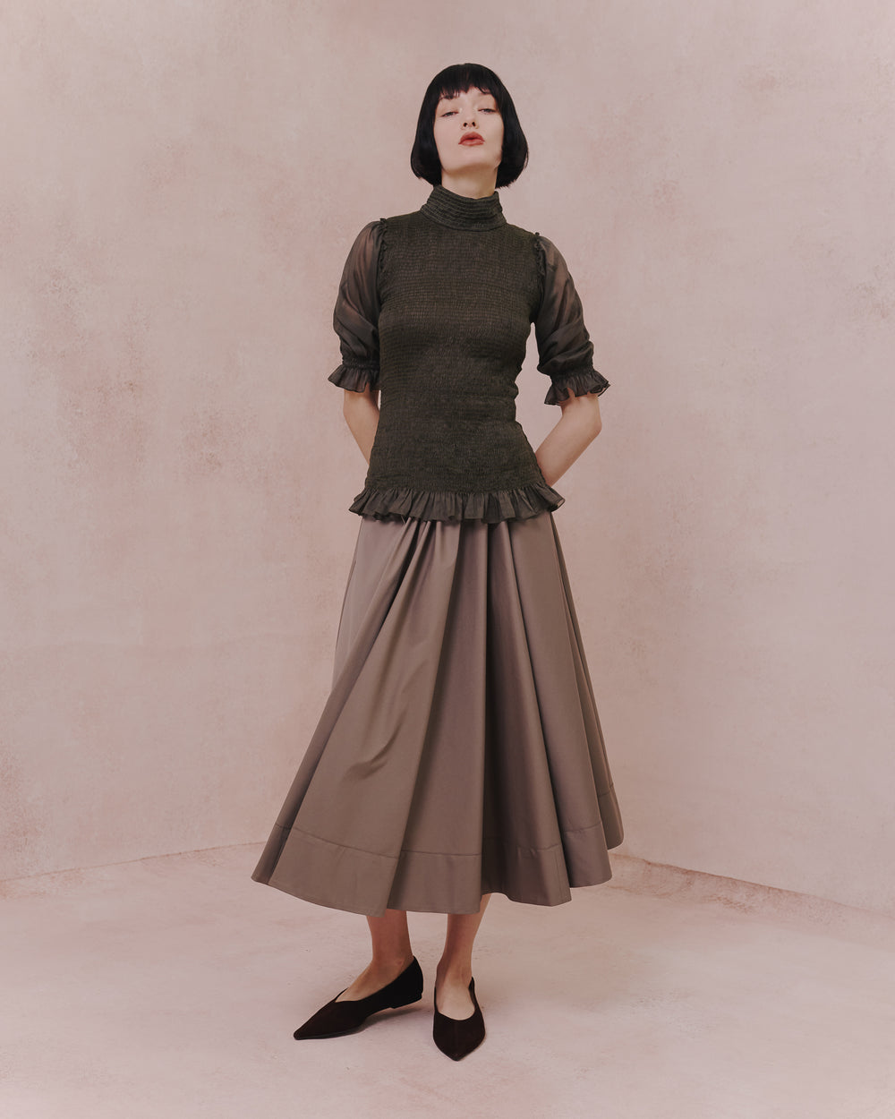 Model wears the Amelia Toro Full Circle Cotton Skirt in tabaco, front view