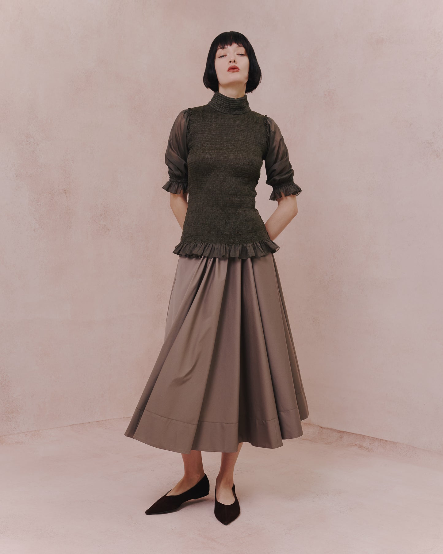 Model wears the Amelia Toro Full Circle Cotton Skirt in tabaco, front view