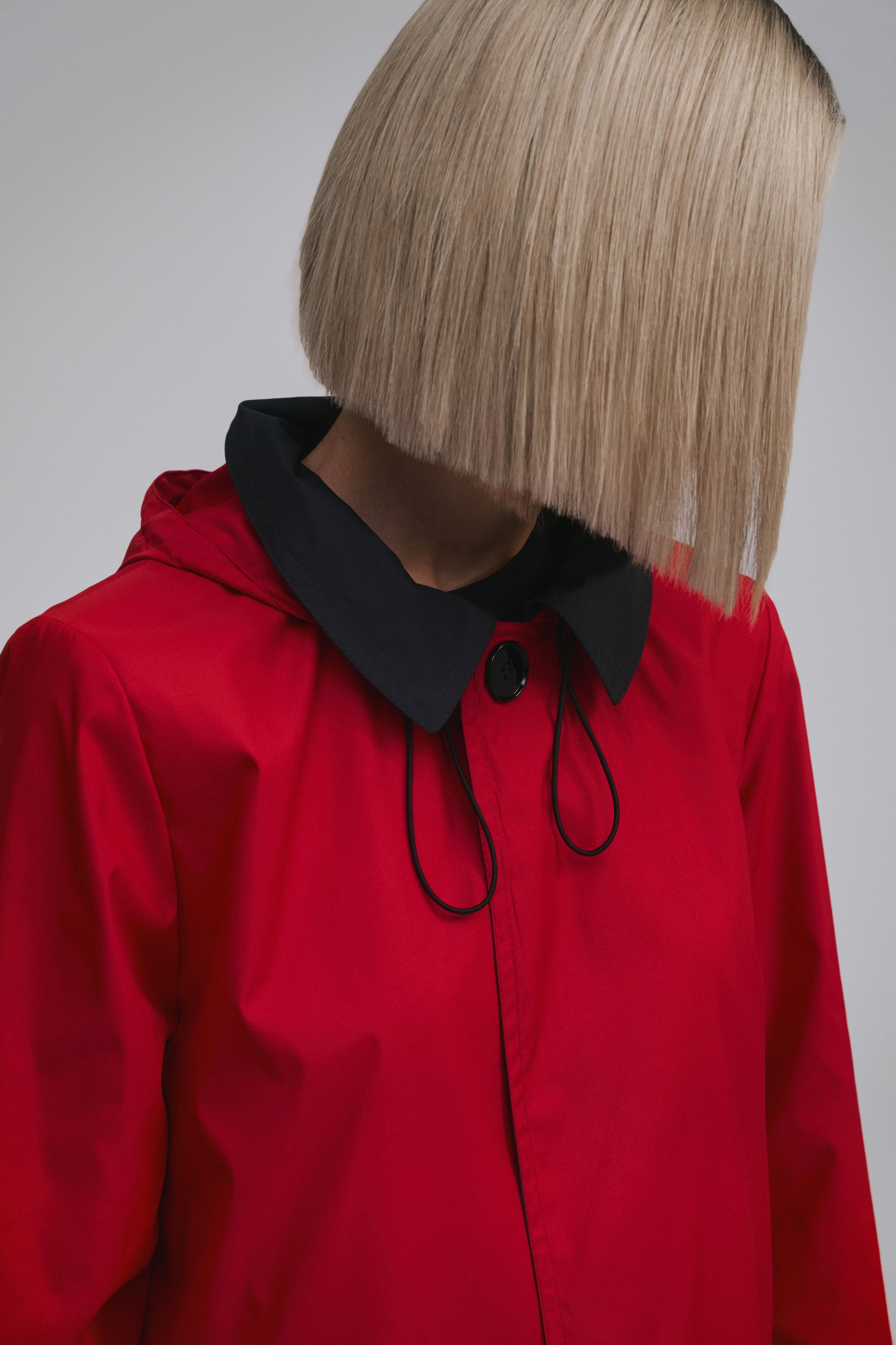 Back view of the Amelia Toro Reversible Double-Face Trench Coat in Blue/Beige