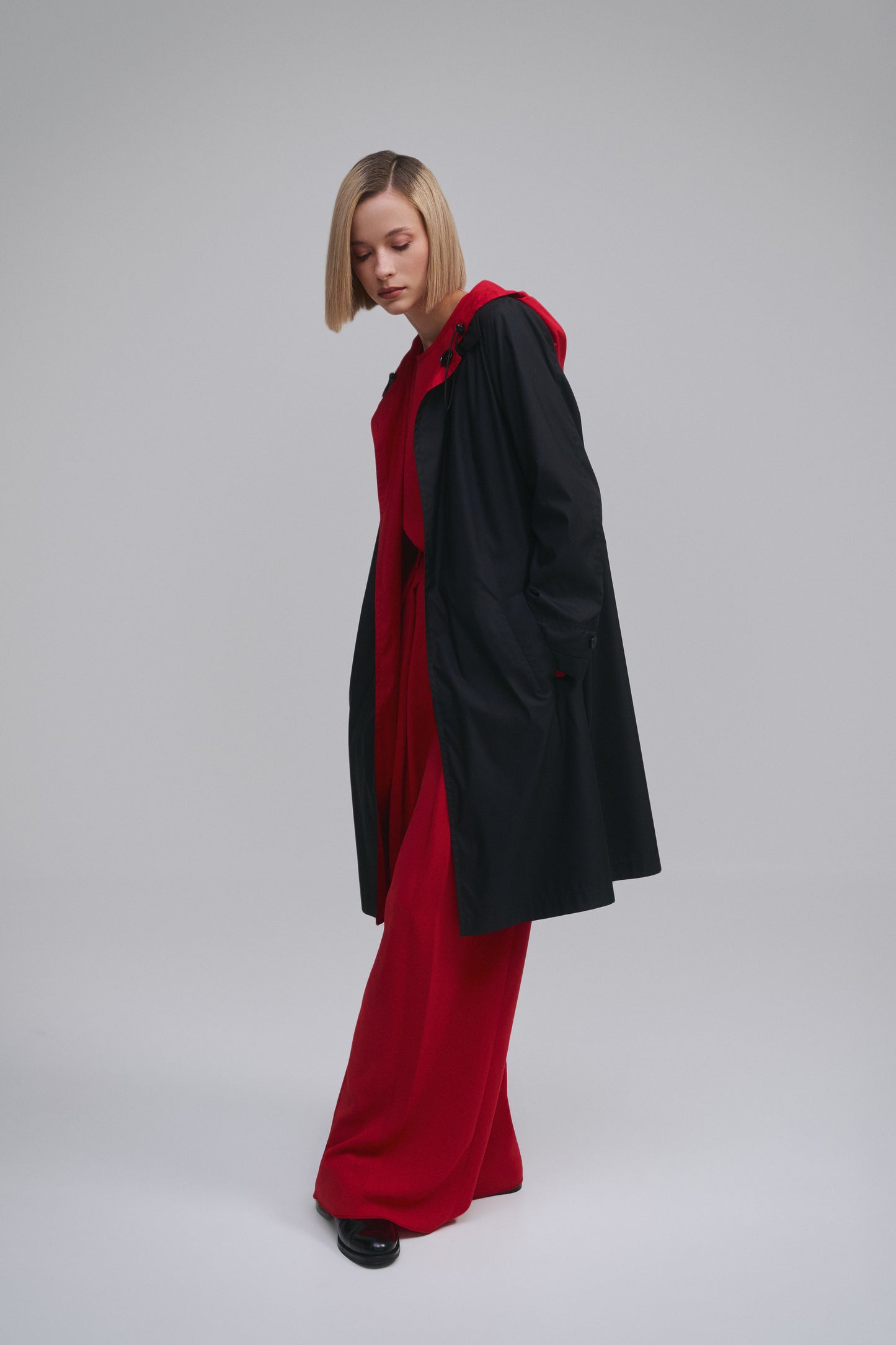 Model wears the Amelia Toro Reversible Double-Face Trench Coat in Blue/Beige, front view