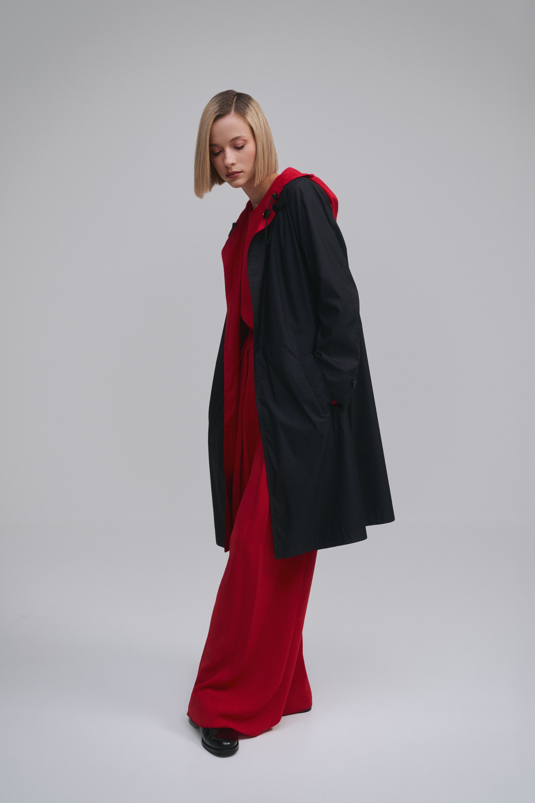 Model wears the Amelia Toro Reversible Double-Face Trench Coat in Blue/Beige, front view
