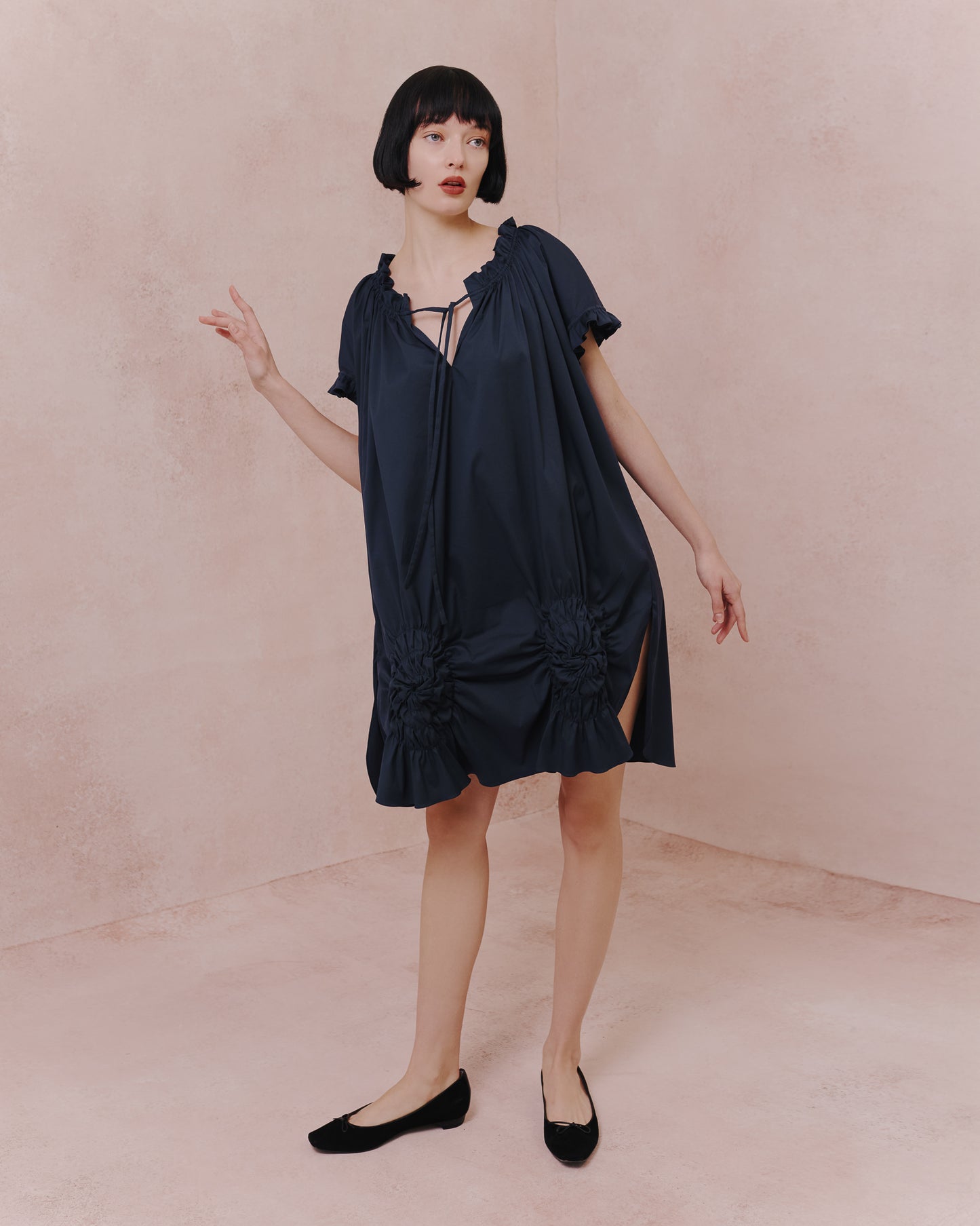 Model wears the Amelia Toro Ruched Cotton Tunic Shirt in tabaco, front view