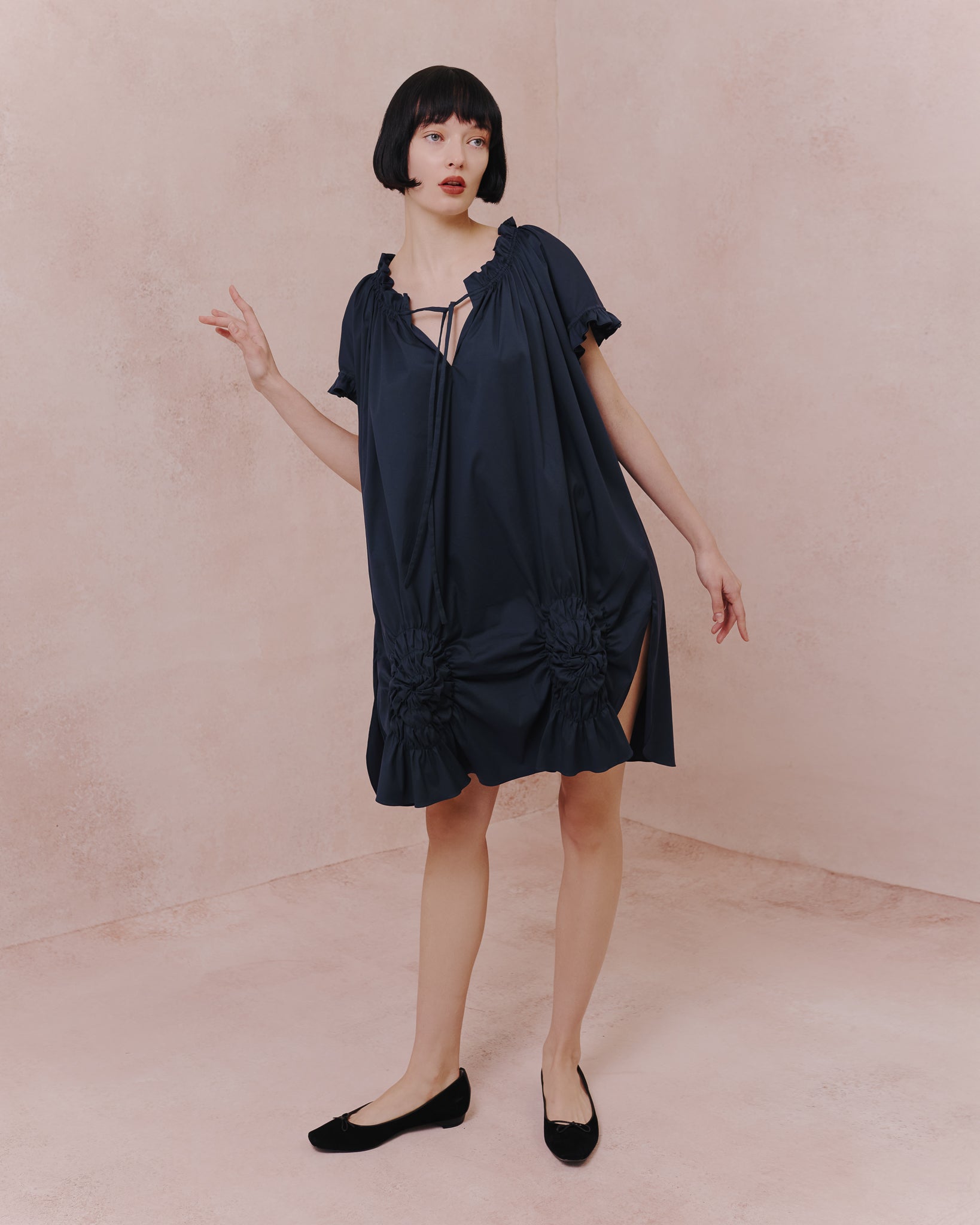 Model wears the Amelia Toro Ruched Cotton Tunic Shirt in tabaco, front view