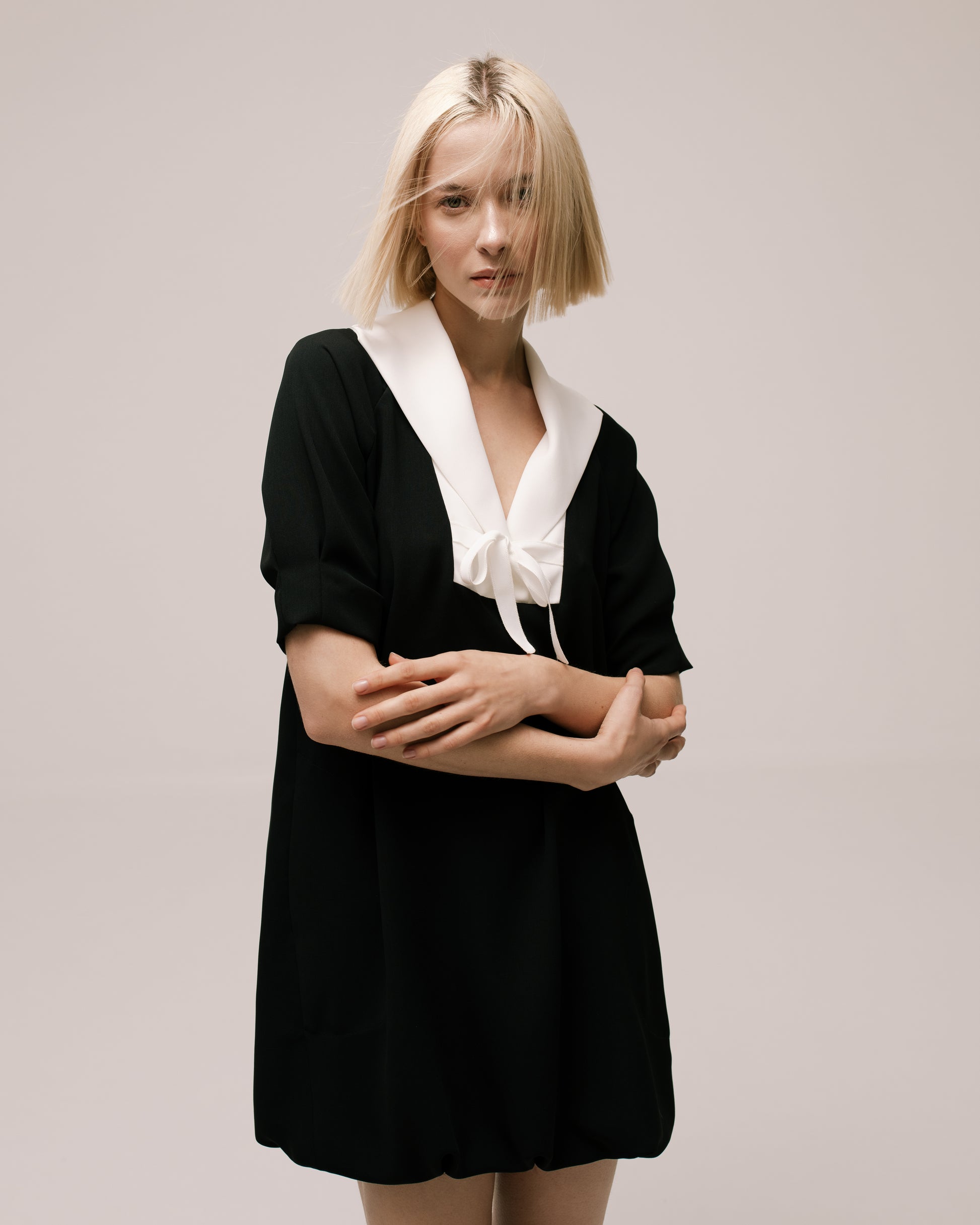 Back view of the Amelia Toro Sailor-Collar Cady Mini Dress in Black