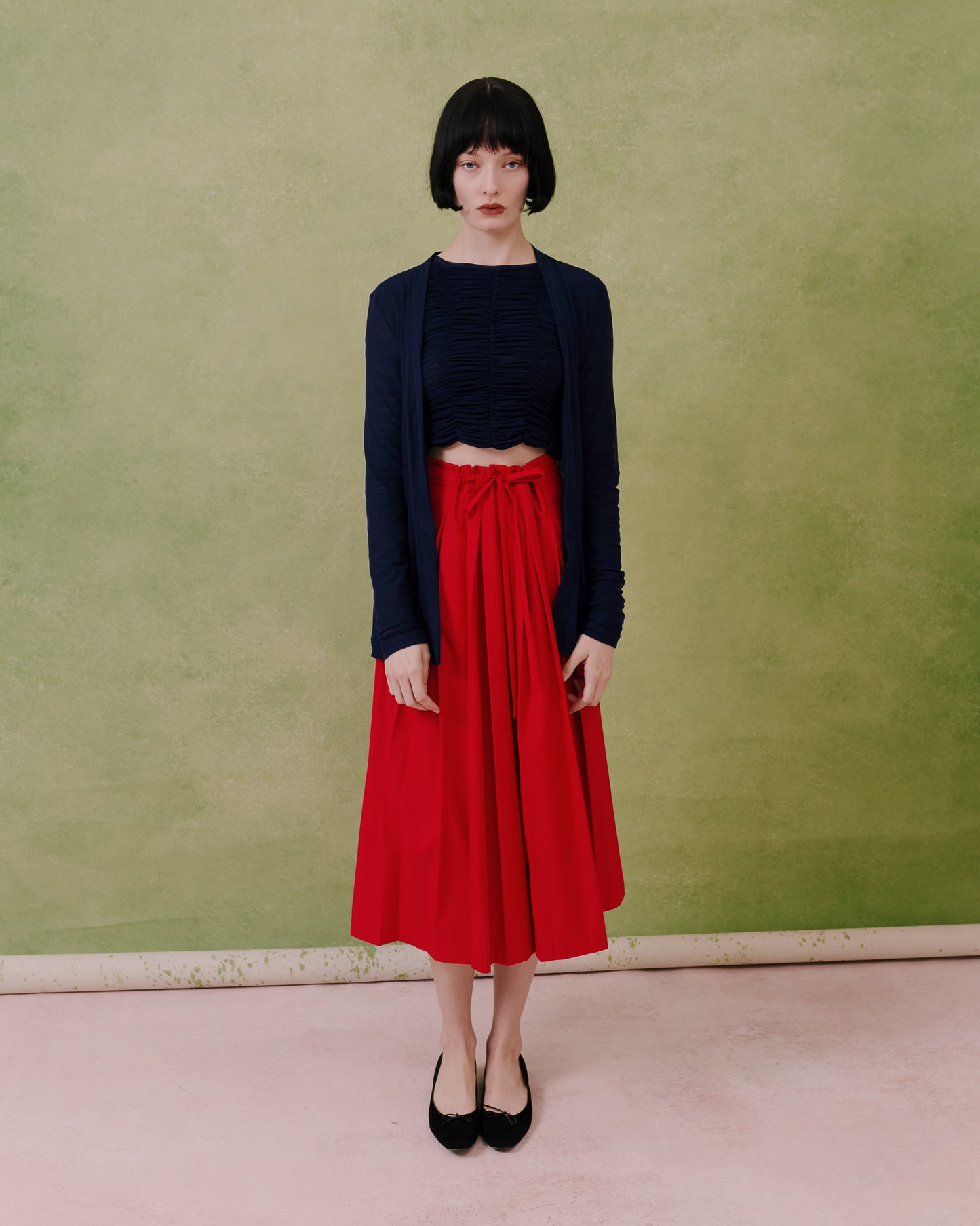 Model wears the Amelia Toro Sheer Tulle Longsleeve Sweater in blue, front view