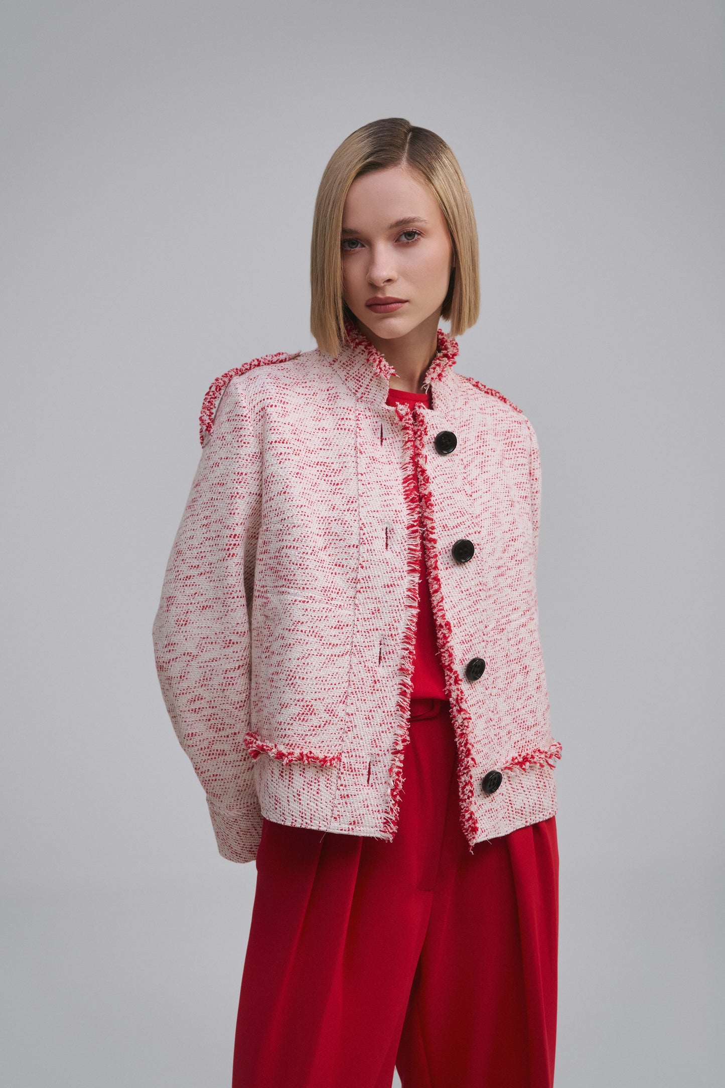 Model wears the Amelia Toro Single-Breasted Cotton Jacket with Epaulettes in Navy Mint, front view