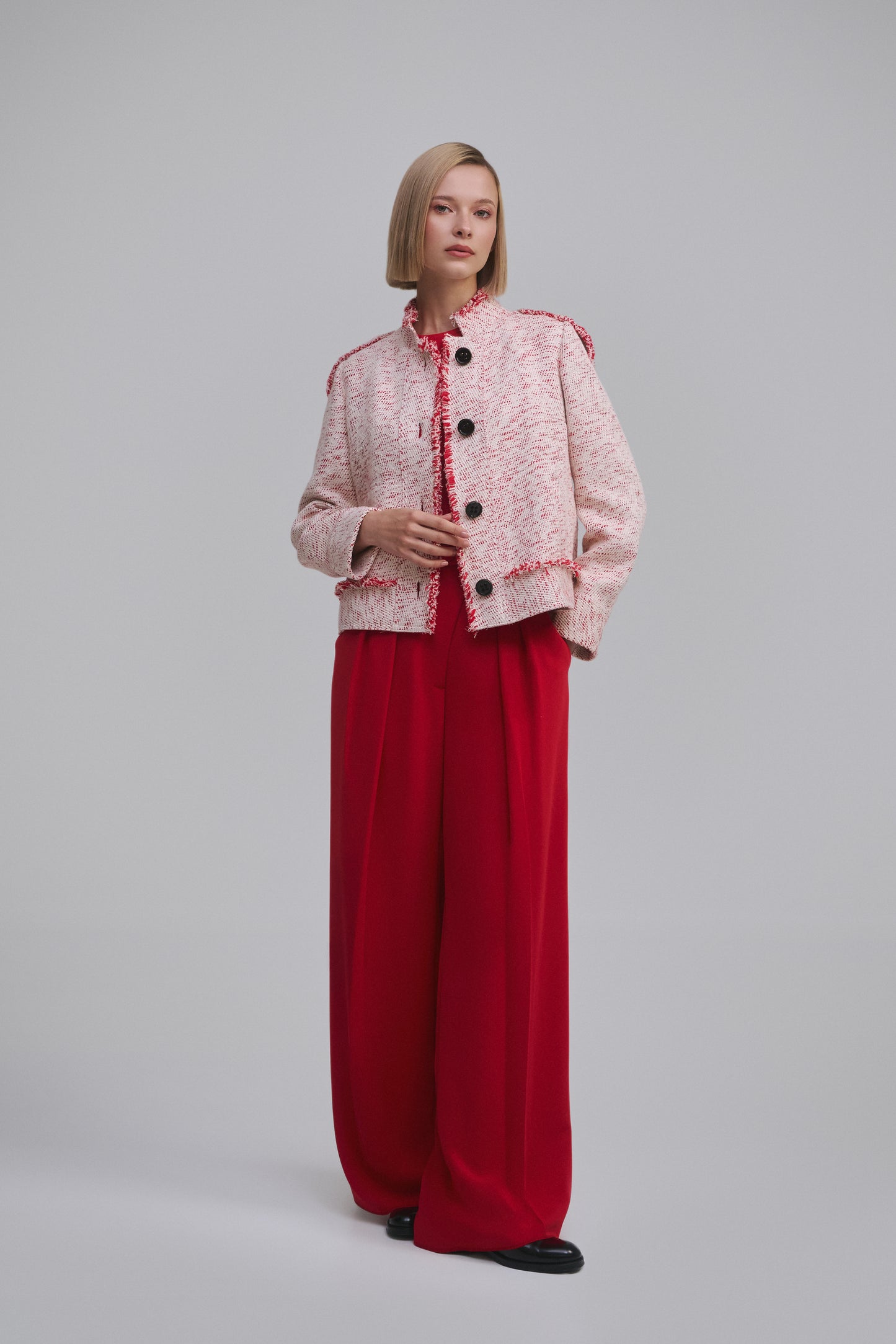 Side view of the Amelia Toro Single-Breasted Cotton Jacket with Epaulettes in Navy Mint