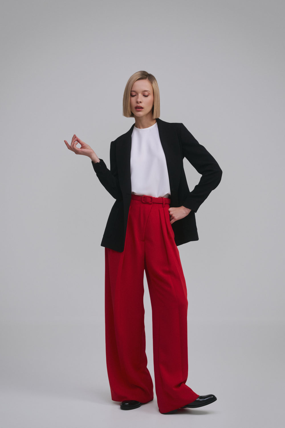 Model wears the Amelia Toro Single-Breasted Tailored Blazer in Black, front view